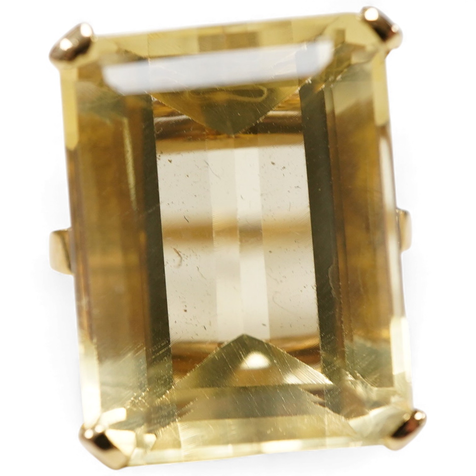 A citrine ring, circa 1973, claw-set with a step-cut citrine measuring approximately 19 x 15 x 11mm, mounted in 9ct gold, size M, British hallmarks, gross weight approximately 10 grams